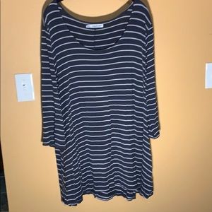 Maurice’s grey stripped tunic with pockets.